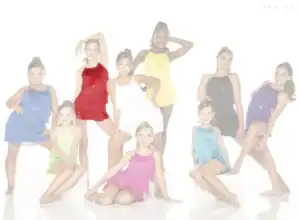 Young dancers pose in colorful fringe costumes.