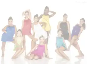 Young dancers pose in colorful fringe costumes.