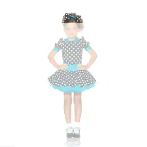 Girl wearing black polka-dot dress with turquoise accents