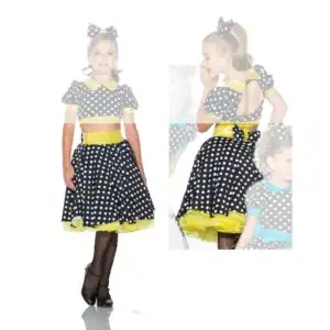 Girl modeling black polka-dot dance costume with yellow trim