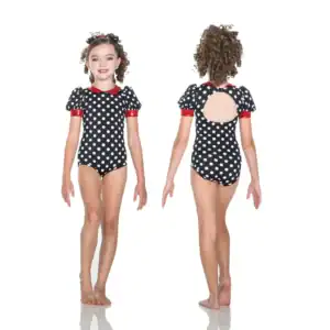 Girl modeling black polka-dot leotard, front and back views