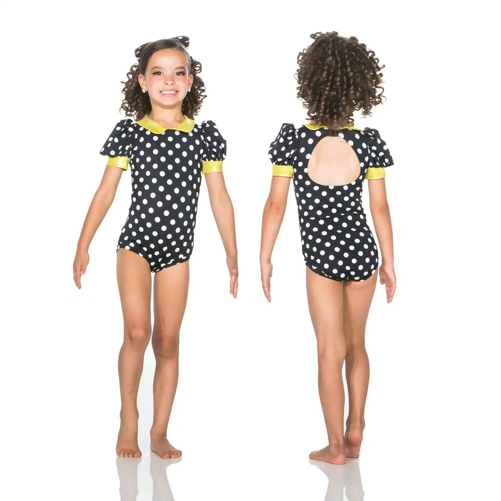 Girl modeling black polka-dot leotard, front and back views