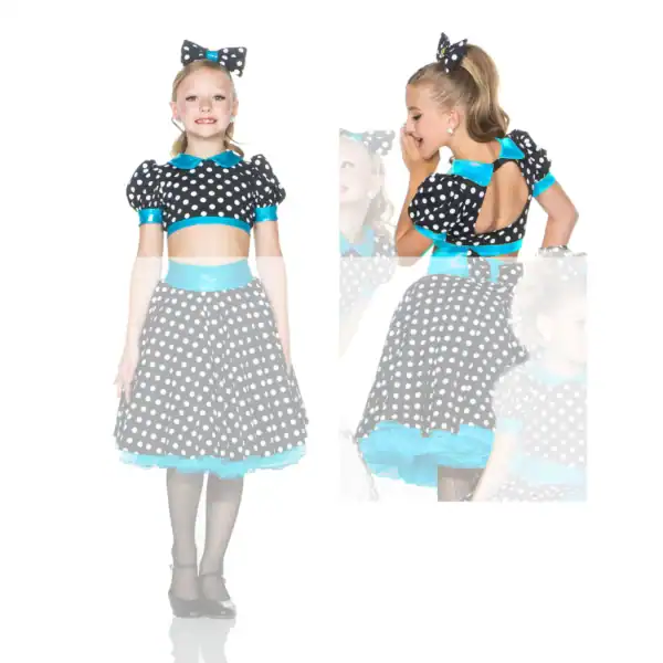 Girl wearing black polka-dot dance costume with turquoise accents