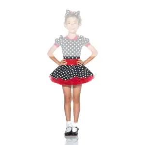 Smiling girl in black polka-dot dress with red accents
