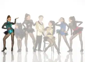 Young dancers posing in colorful costumes against white background