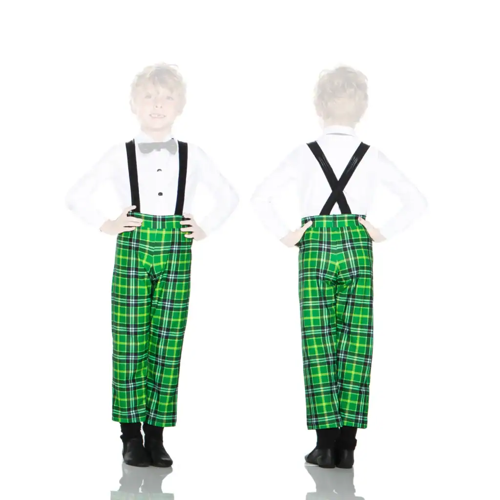 Boy modeling green plaid pants with black suspenders