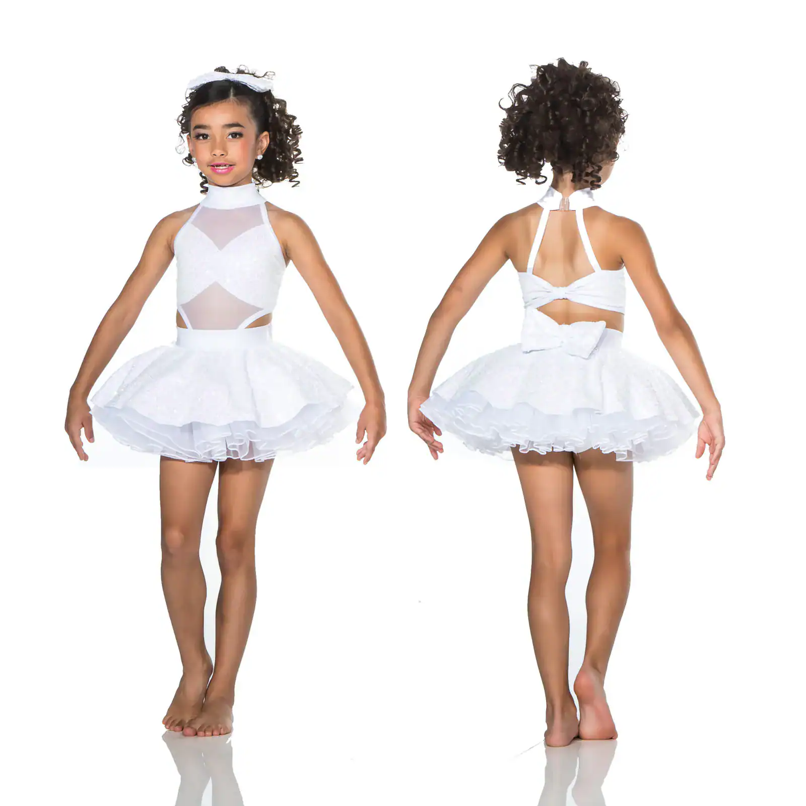 Girl modeling white tutu dress, front and back views