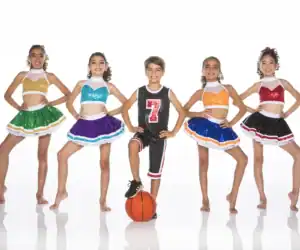 Five children in colorful cheerleading outfits pose with basketball.