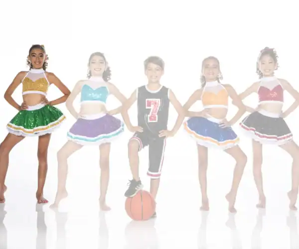 Five children in colorful cheer outfits, boy standing on basketball