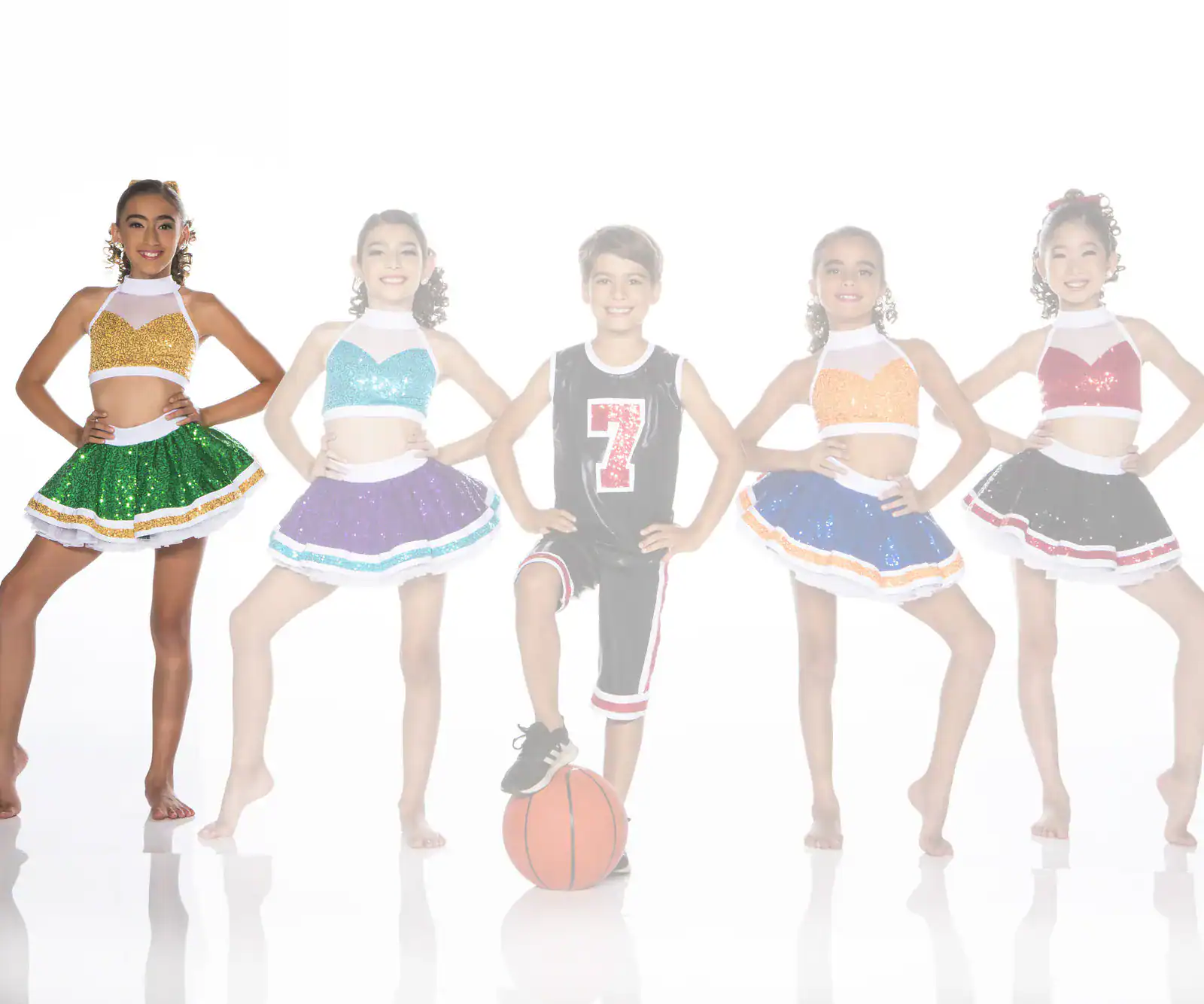 Five children in colorful cheer outfits, boy standing on basketball