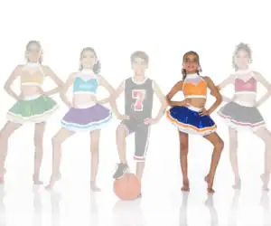 Five children in cheerleading and basketball uniforms posing together