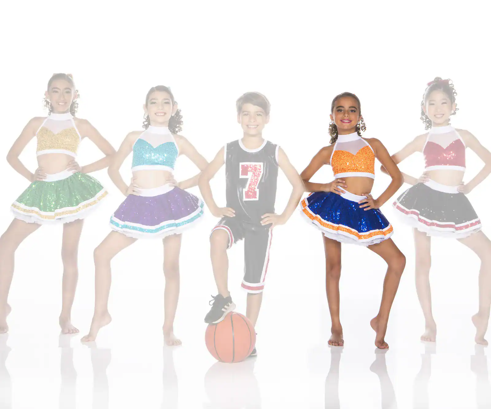 Five children in cheerleading and basketball uniforms posing together