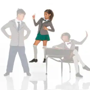 Three children in school uniforms posing dramatically on white background.