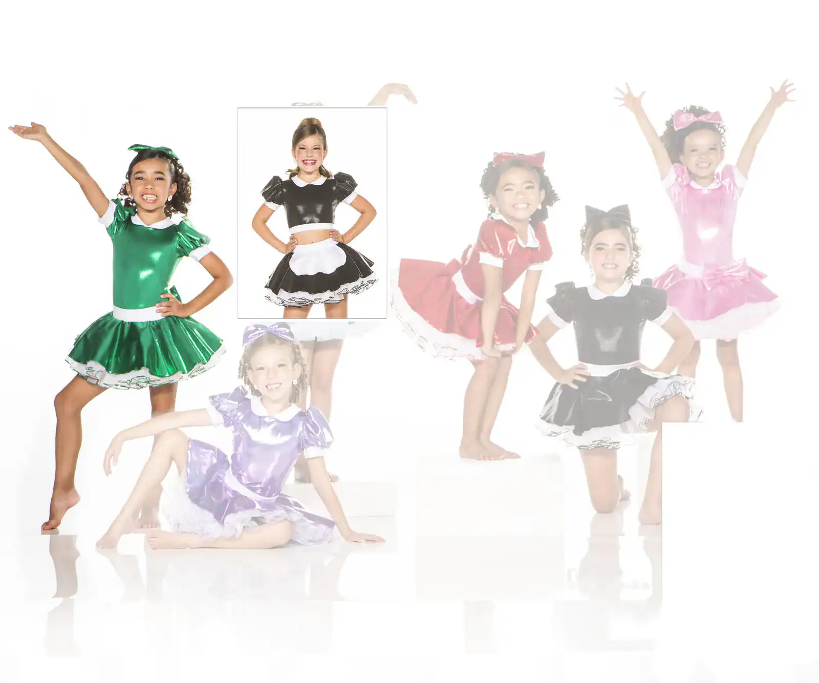 Girls modeling colorful shiny dance costumes against white background
