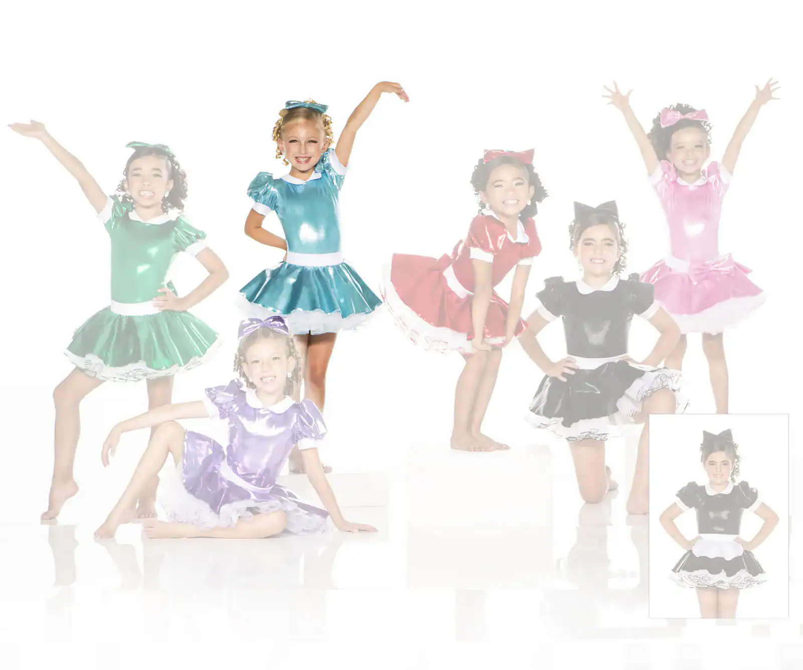 Six girls wearing colorful dance costumes pose together.
