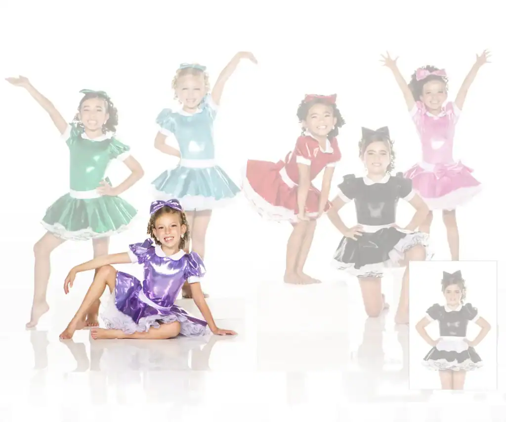 Girls wearing colorful shiny dance costumes posing in studio
