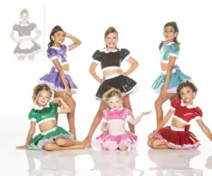 Girls modeling colorful shiny dance costumes on white background