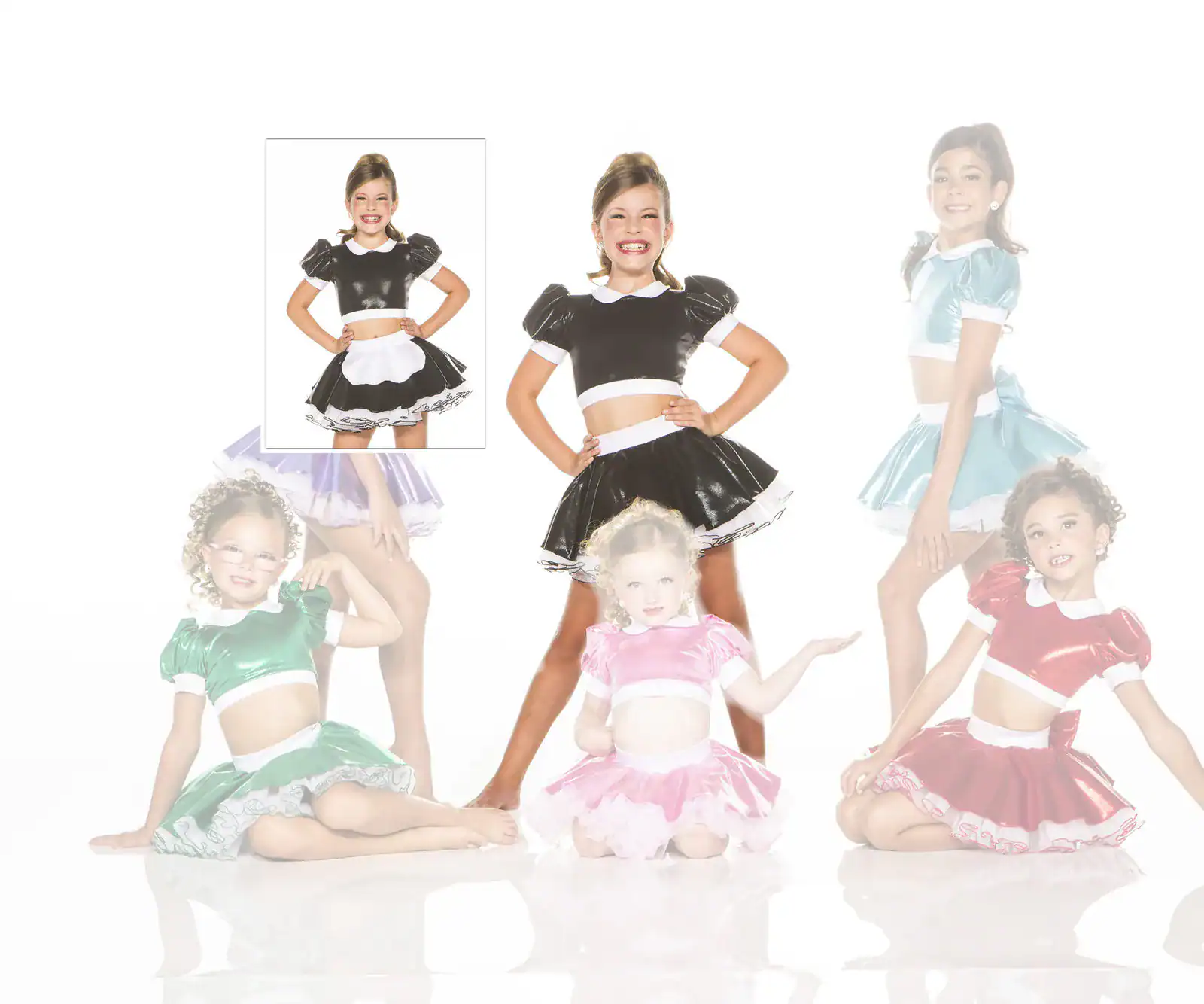 Girls modeling colorful shiny dance costumes on a white background