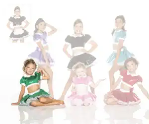 Young dancers wearing colorful shiny costumes pose together.