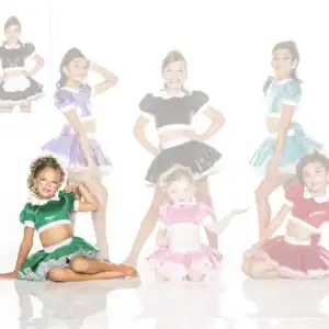 Young dancers wearing colorful shiny costumes pose together.