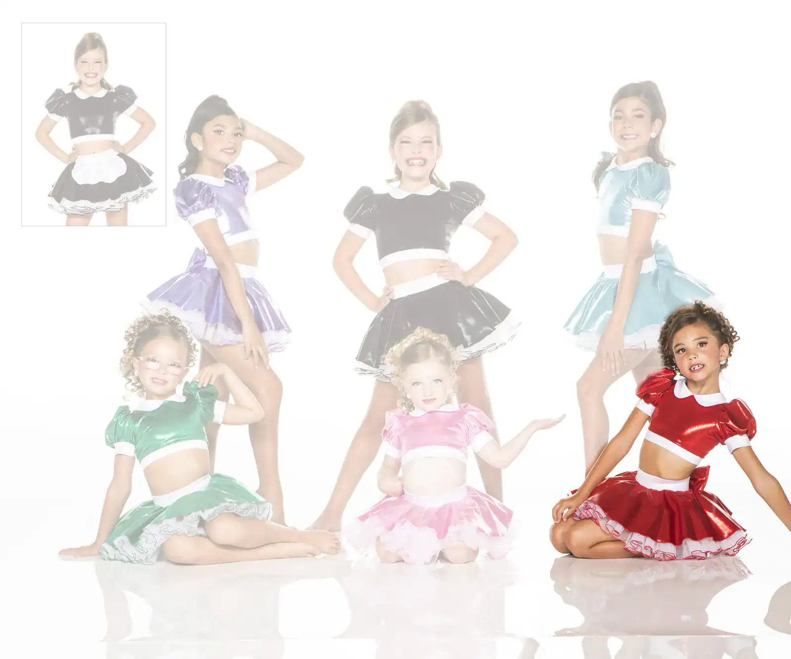 Girls modeling colorful shiny dance costumes on white background