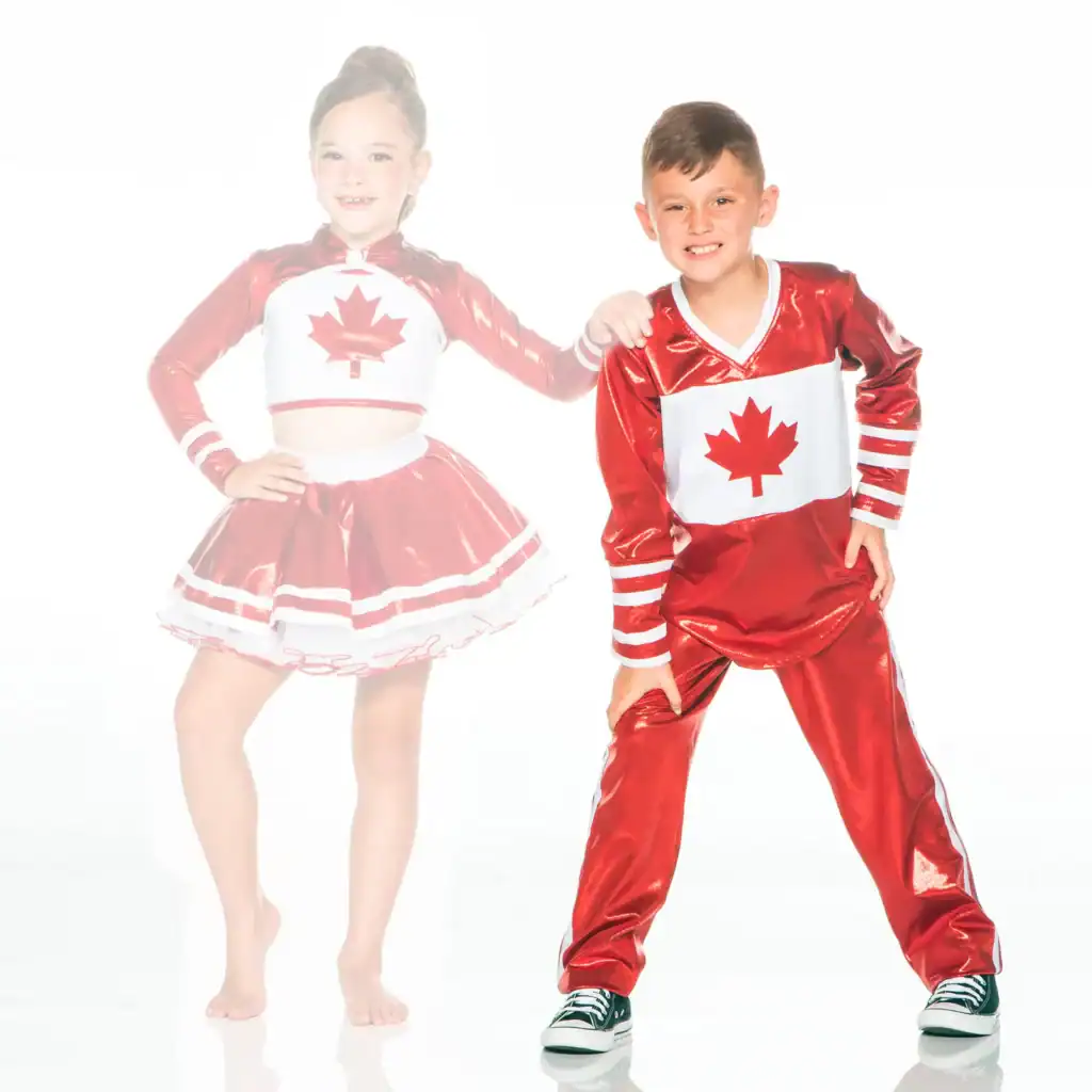 Two children wearing red Canadian-themed dance costumes