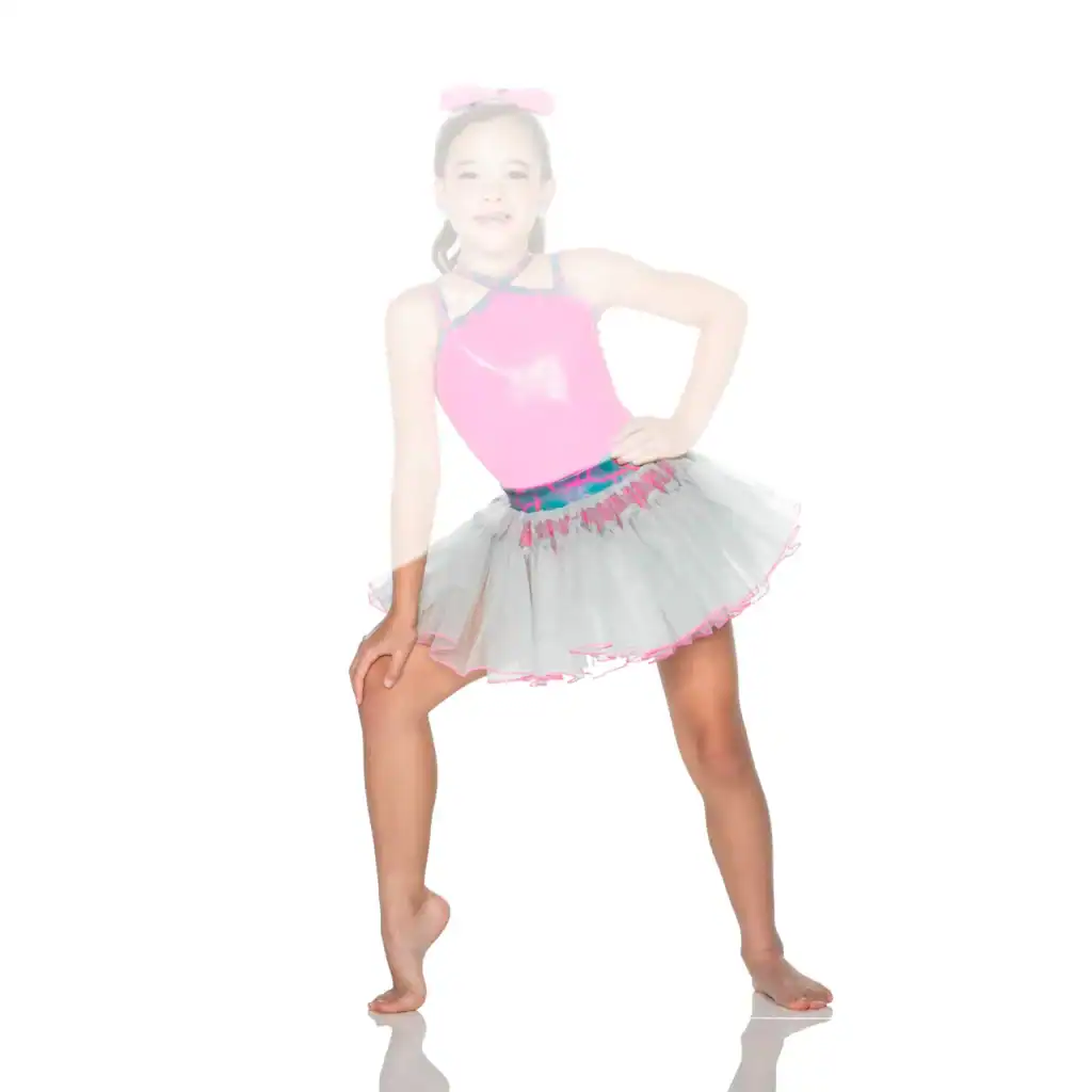 Young girl posing in pink leotard and gray tutu