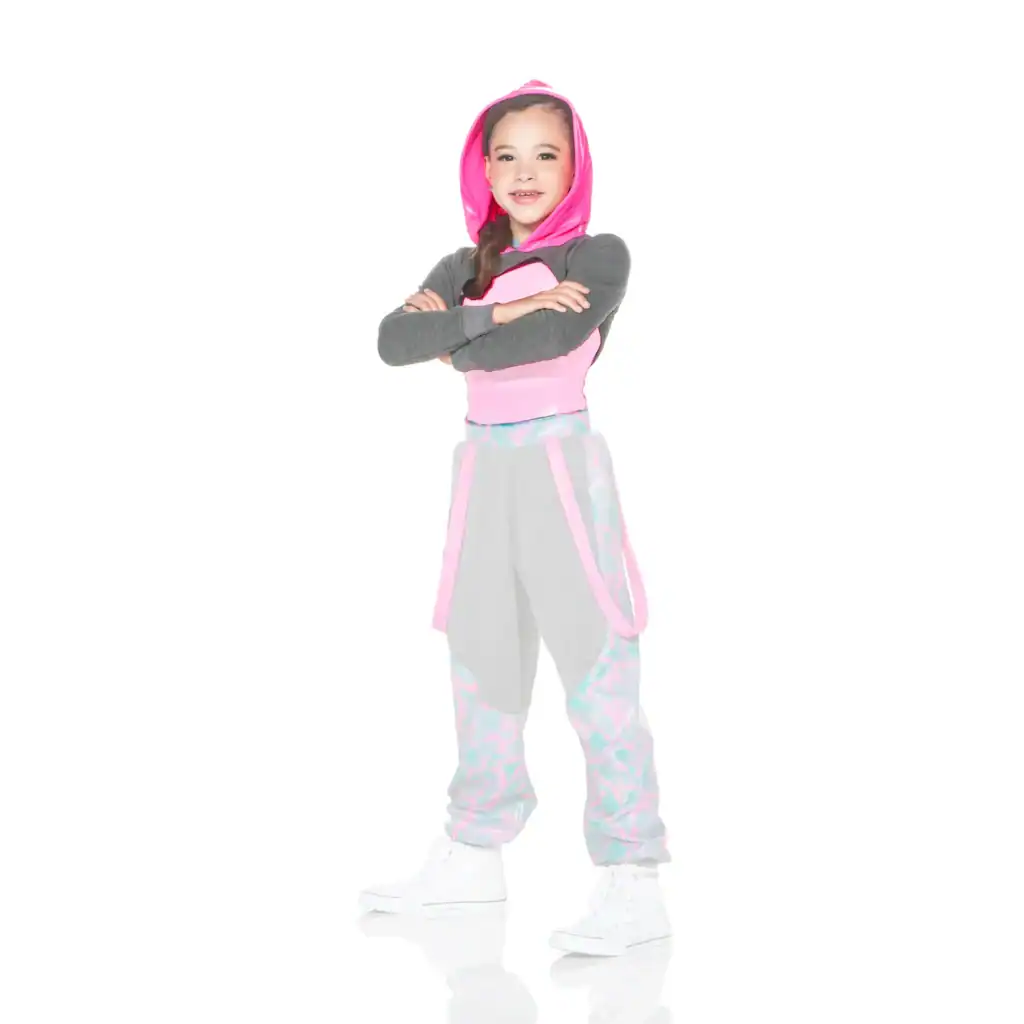 Smiling girl wearing pink hooded dance outfit