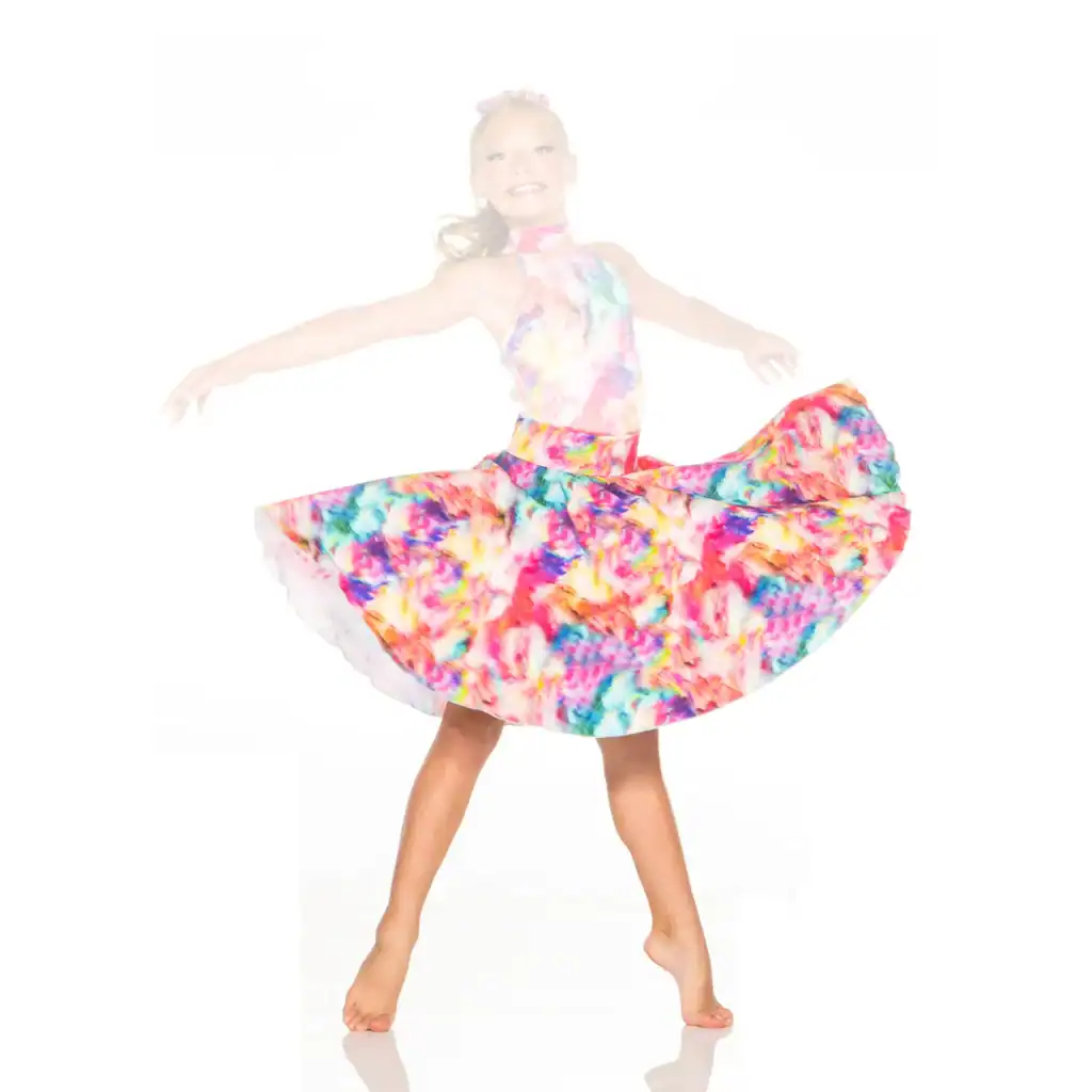 Young dancer twirls in colorful floral costume