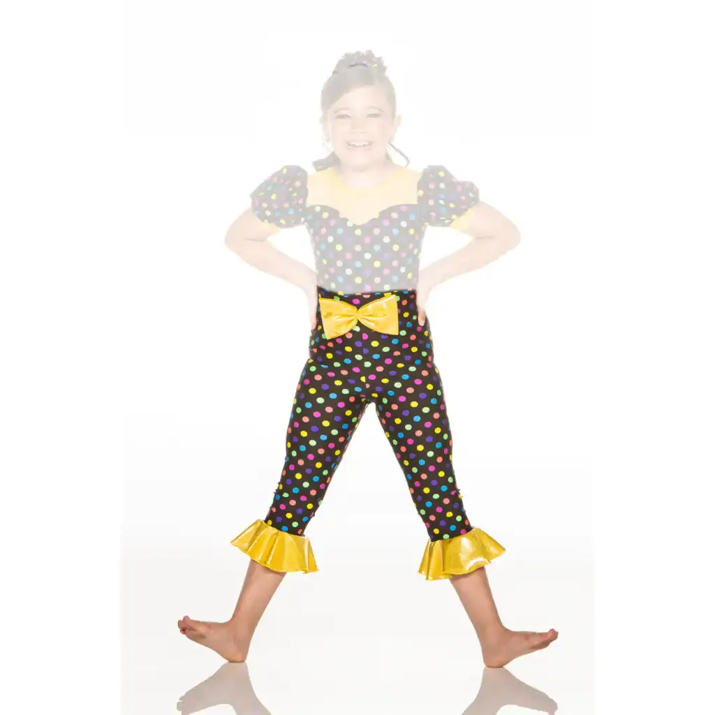 Smiling girl in colorful polka-dot dance costume