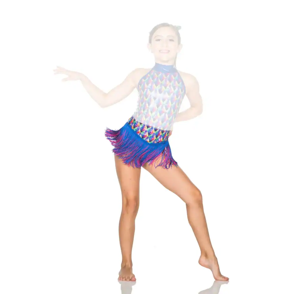 Young dancer wearing colorful fringed costume poses barefoot