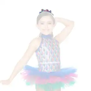 Young dancer in colorful costume posing against white background