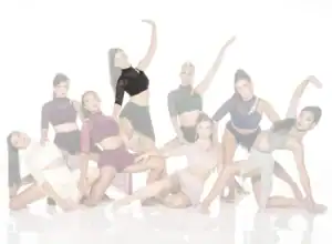 Eight female dancers posing in contemporary costumes against white background