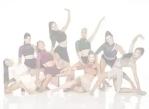 Eight female dancers posing in a bright white studio