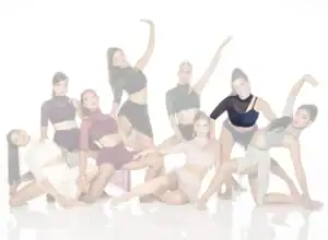 Eight female dancers posing in contemporary costumes against white background