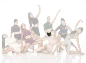Eight female dancers pose in contemporary costumes.