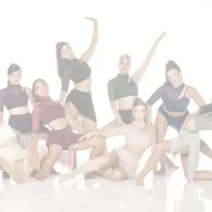 Eight young dancers pose in contemporary costumes against white background.