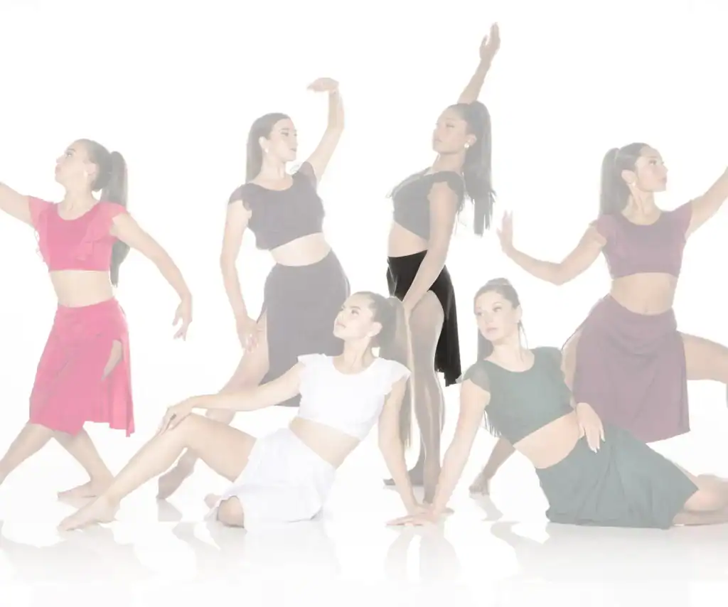 Six women in colorful outfits pose as dancers.