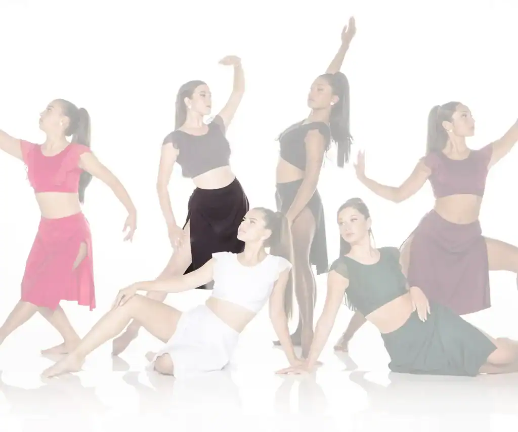 Six dancers posing in colorful outfits against a white background