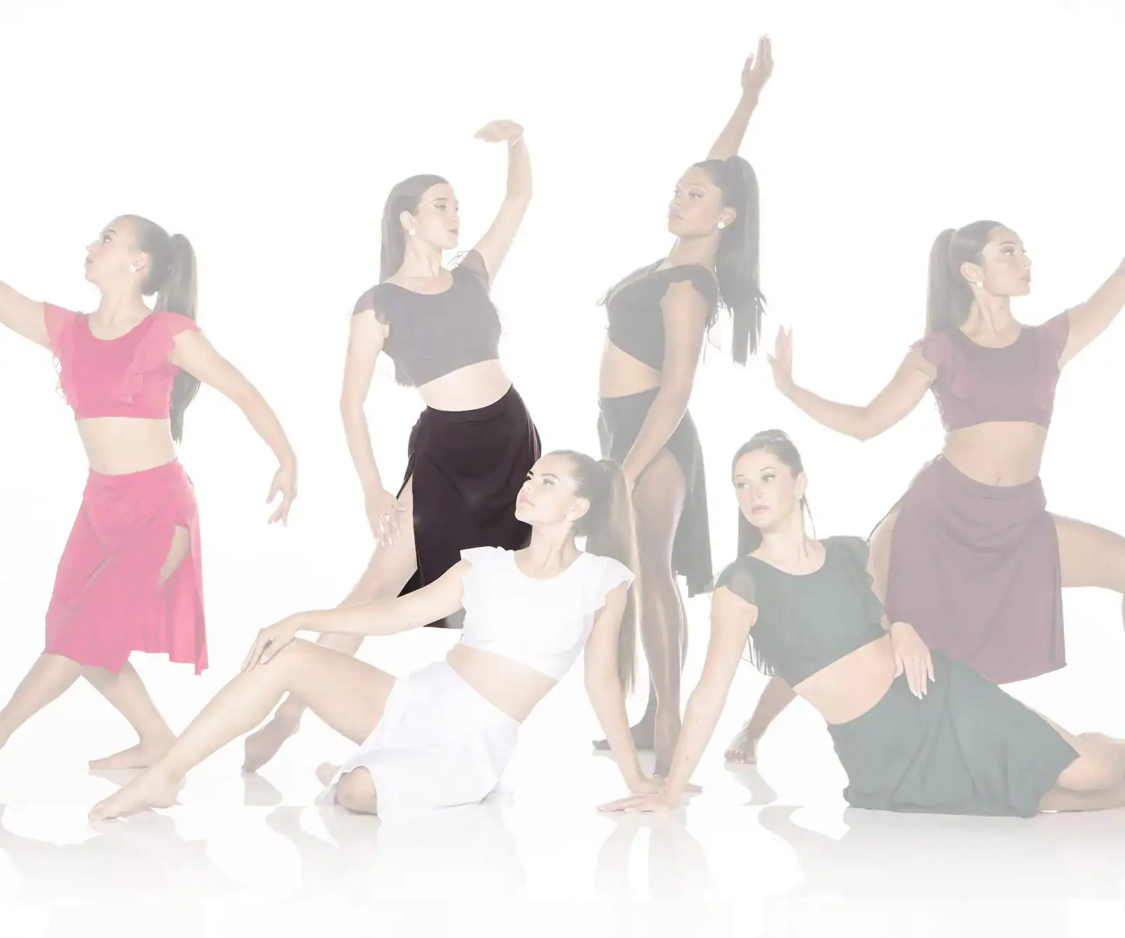 Six dancers posing in colorful outfits against a white background