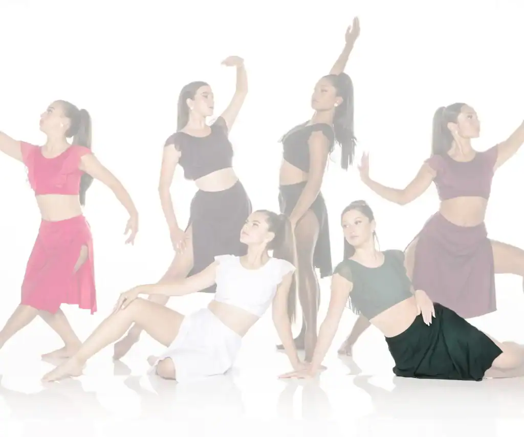Six dancers posing in colorful costumes against a white background
