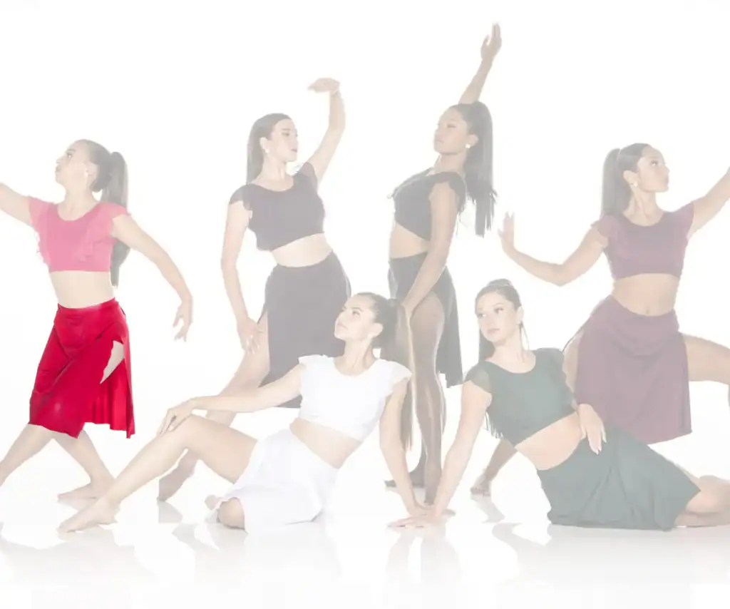Six female dancers posing in colorful contemporary costumes