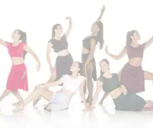 Six dancers posing in colorful outfits against a white background