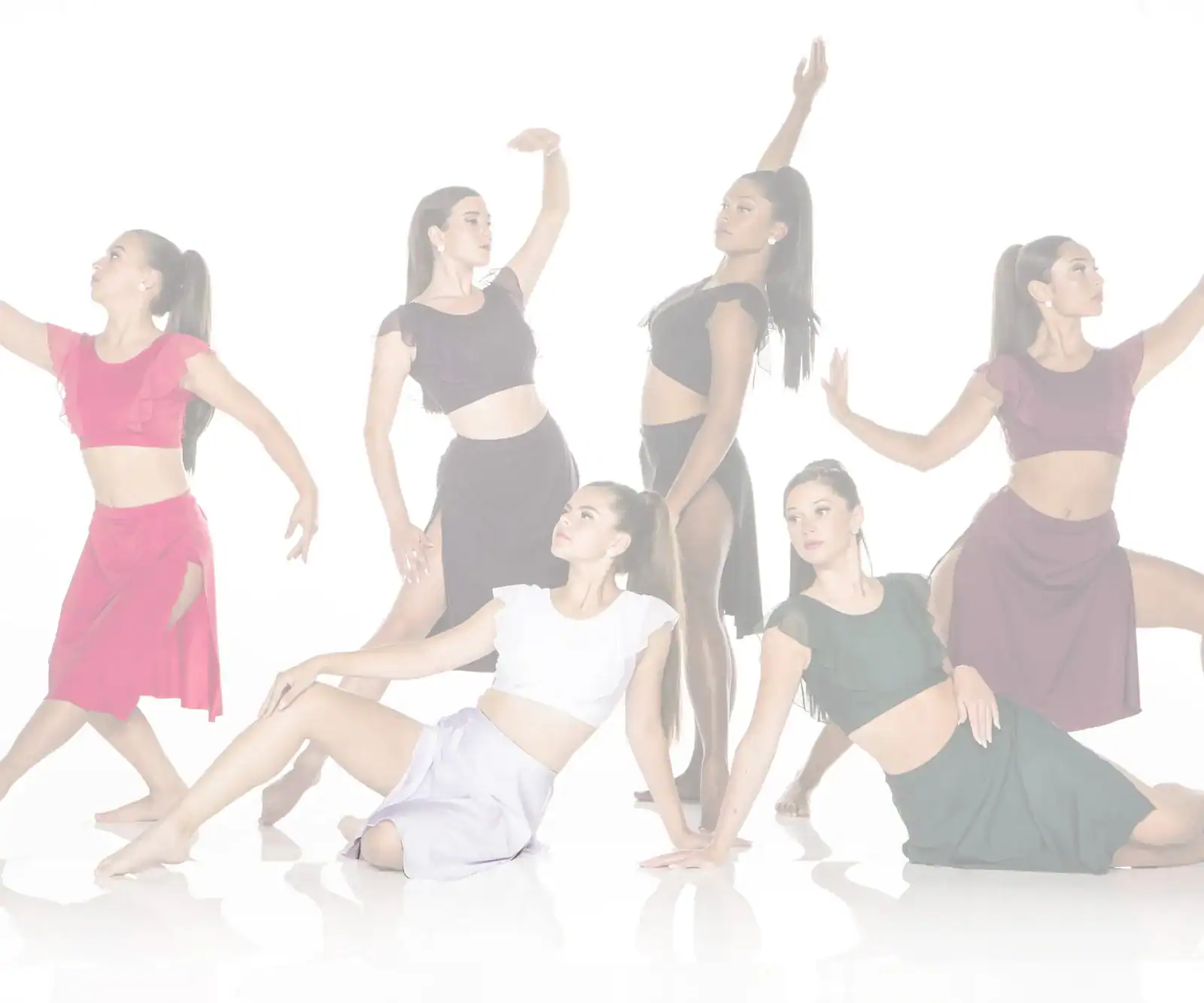Six dancers posing in colorful outfits against a white background