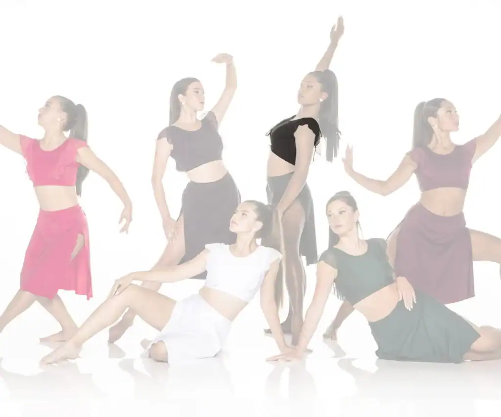 Six dancers posing in colorful costumes against a white background