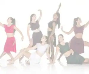 Six dancers posing in colorful contemporary dance costumes