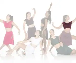Six dancers pose in colorful outfits against white background.