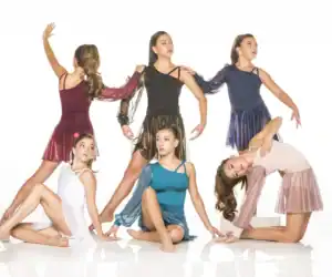 Five young dancers posing in colorful contemporary costumes