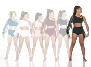 Six dancers modeling colorful asymmetrical dancewear against white background