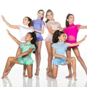 Six young dancers in colorful costumes pose against white background.
